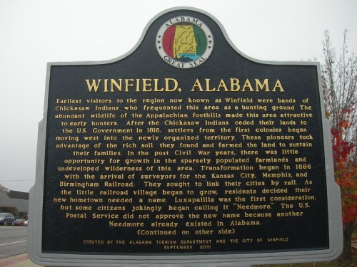 Sign about Winfield, Alabama, detailing its history, early settlers, and the impact of the railroad. September 2010.