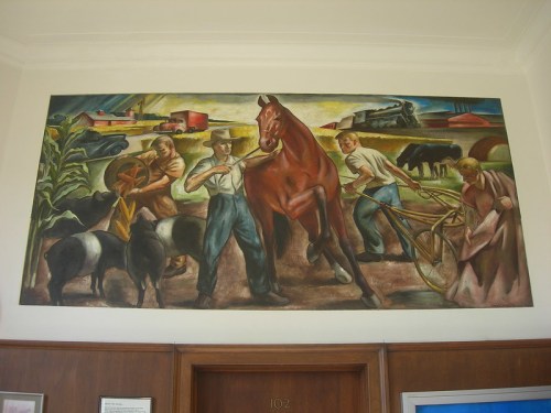 A colorful mural depicting farmers working with animals and machinery in a rural setting.