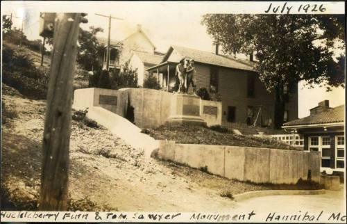 Black and white photo of the Huckleberry Finn and Tom Sawyer Monument in Hannibal, Missouri, taken in July 1926.
