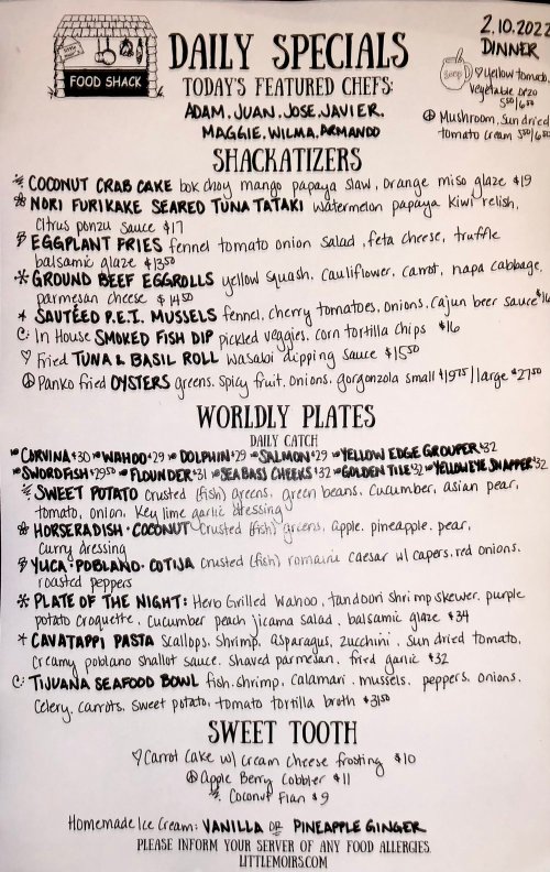 Menu featuring daily specials, including dishes like coconut crab cake, eggplant fries, and various worldly plates and desserts.