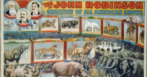 Colorful vintage poster for the John Robinson circus, featuring various animals like lions, tigers, and elephants.