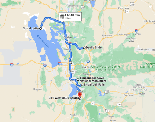 Map showing a route from Spiral Jetty to Devils Slide, including Timpanogos Cave and Bridal Veil Falls, with travel time.