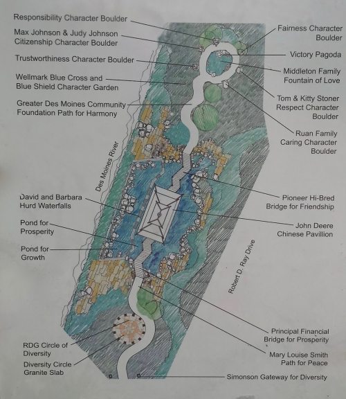 Map of a park featuring character boulders, water features, and pathways, highlighting various community values and landmarks.
