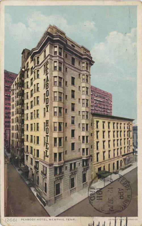 Historic postcard of the Peabody Hotel in Memphis, Tennessee, showcasing its distinctive architecture and signage.