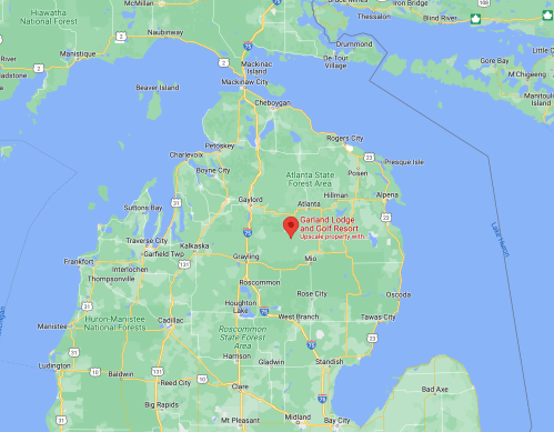 Map showing northern Michigan with a marker for Garland Lodge and Golf Resort near Grayling.