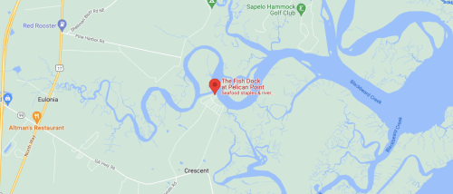 Map showing "The Fish Dock at Pelican Point" location near Eulonia, GA, along the river and seafood staples.