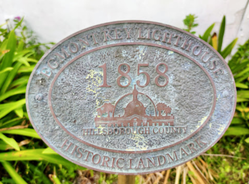 Plaque for Egmont Key Lighthouse, established in 1858, designated as a historic landmark in Hillsborough County.