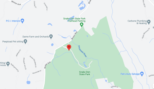 Map showing the location of Snake Den State Park and nearby roads and landmarks.