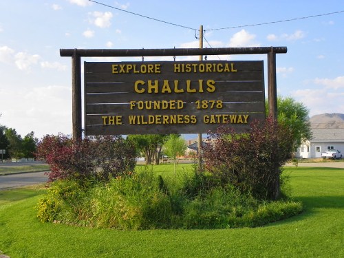 Sign welcoming visitors to Challis, Idaho, highlighting its historical significance and founding year of 1878.