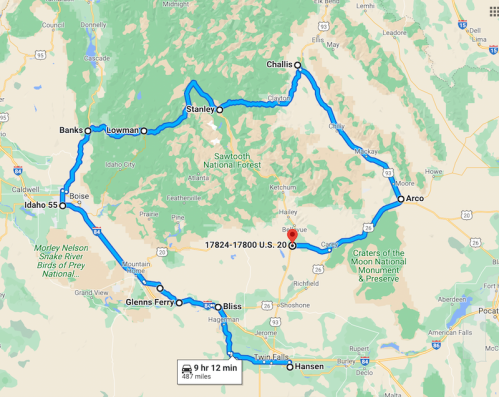 Map showing a scenic route through Idaho, highlighting towns like Boise, Stanley, and Challis, with travel time noted.