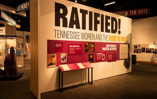 Exhibit wall titled "Ratified! Tennessee Women and the Right to Vote," featuring historical information and artifacts.
