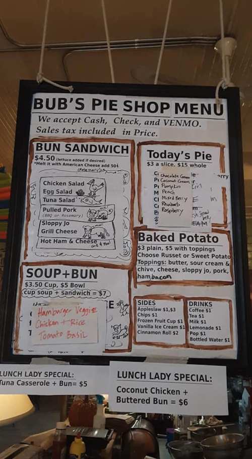 Menu board for Bub's Pie Shop featuring sandwiches, soup, baked potatoes, and daily specials with prices listed.