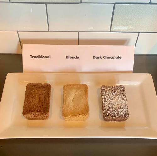 Three rectangular desserts on a plate labeled "Traditional," "Blonde," and "Dark Chocolate."