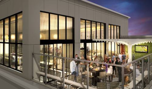 A modern restaurant exterior with large windows, outdoor seating, and a lively atmosphere during twilight.