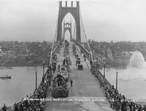 Historic photo of St. Johns Bridge dedication in Portland, Oregon, featuring a decorated bridge and crowds in 1919.
