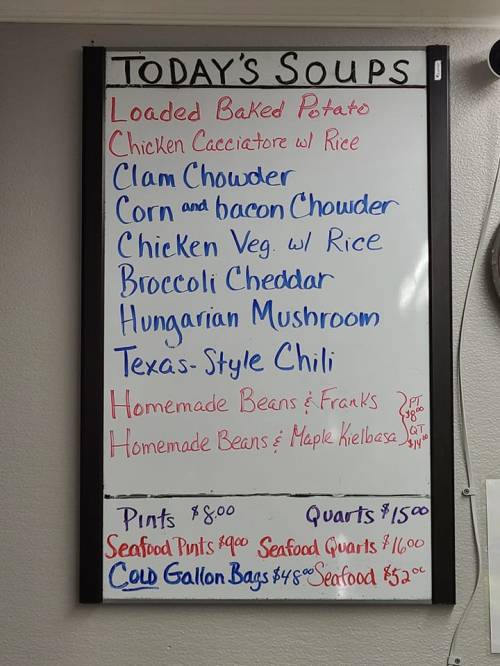 Menu board listing today's soups: Loaded Baked Potato, Chicken Cacciatore, Clam Chowder, and more, with prices.