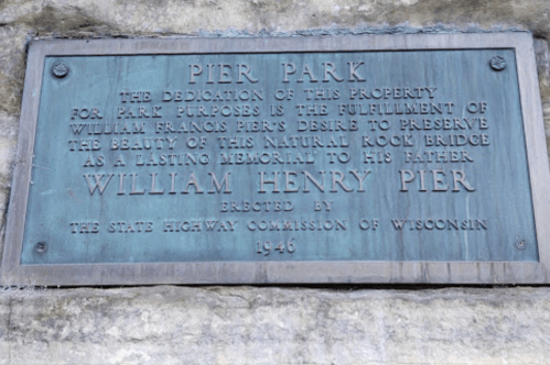 Bronze plaque dedicating Pier Park, honoring William Henry Pier, established by the Wisconsin State Highway Commission in 1946.