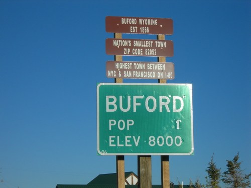 Sign for Buford, Wyoming, noting it's the nation's smallest town, established in 1866, with an elevation of 8,000 feet.