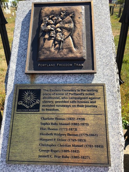 Plaque honoring Portland's abolitionists at Eastern Cemetery, listing their names and contributions to the freedom movement.