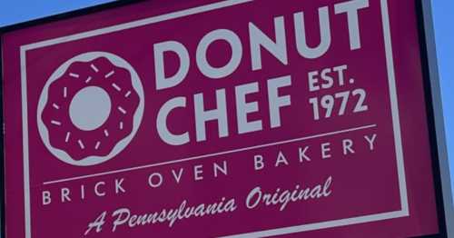 Sign for Donut Chef, a brick oven bakery established in 1972, featuring a donut graphic and "A Pennsylvania Original."