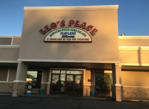 Exterior of Leo's Place, a family-friendly restaurant featuring burgers, pizza, subs, and a play area.