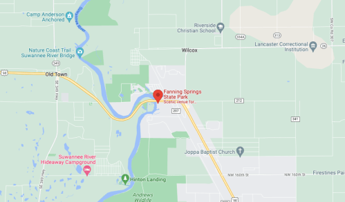 Map showing Fanning Springs State Park location near Wilcox, Florida, with nearby landmarks and roads.