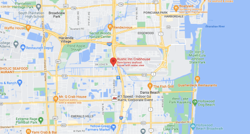 Map showing the location of Rustic Inn Crabhouse near water, with nearby parks and restaurants in the area.