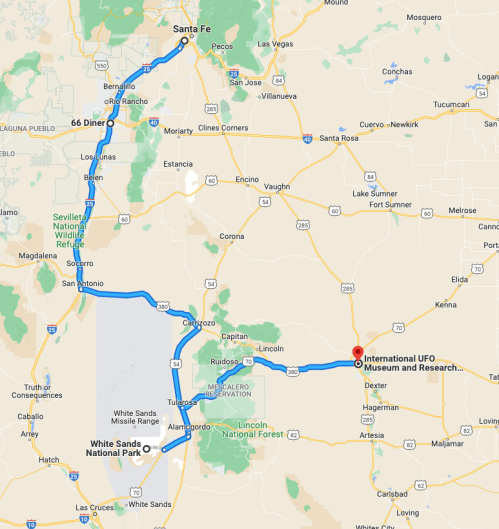 Map showing a route from Santa Fe to the International UFO Museum in Roswell, New Mexico, with notable landmarks.