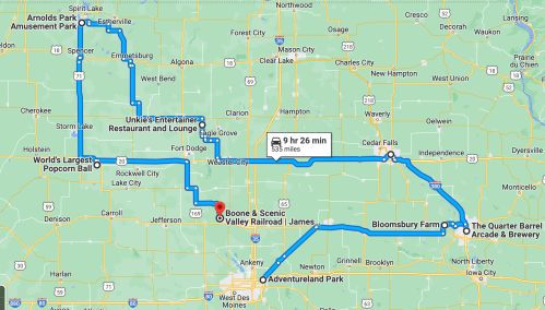 Map showing a route through Iowa, highlighting attractions like amusement parks, restaurants, and a scenic railroad.