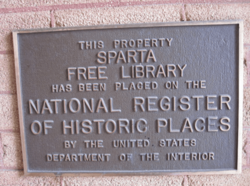 Plaque indicating Sparta Free Library is listed on the National Register of Historic Places by the U.S. Department of the Interior.