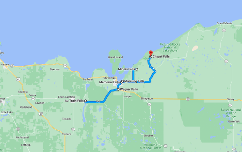 Map showing a route from Au Train Falls to Chapel Falls, highlighting various waterfalls along the way in Michigan.