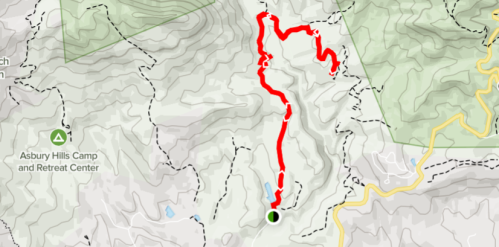 Map showing a winding red trail through hilly terrain, with nearby landmarks like Asbury Hills Camp and Retreat Center.