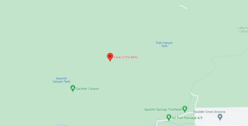 Map showing the location of "Cave of the Bells" in a green landscape with nearby trails and canyons.