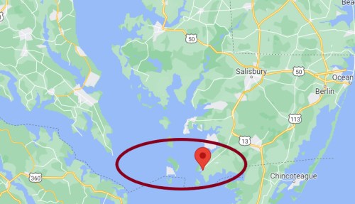 Map showing a coastal area with a red marker indicating a specific location near Chincoteague and Salisbury, Maryland.