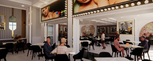 A stylish café interior with patrons seated at tables, featuring elegant decor and large framed artworks on the walls.