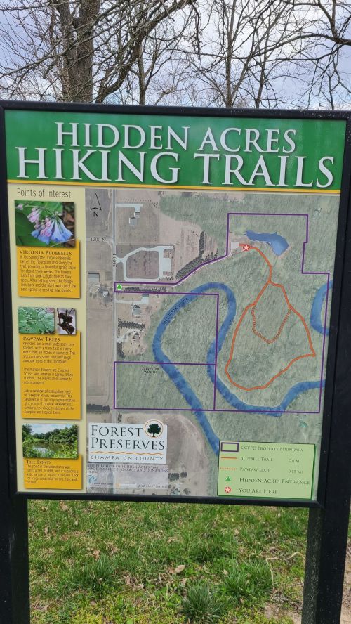 Map of Hidden Acres Hiking Trails, highlighting points of interest and trail routes in a forested area.
