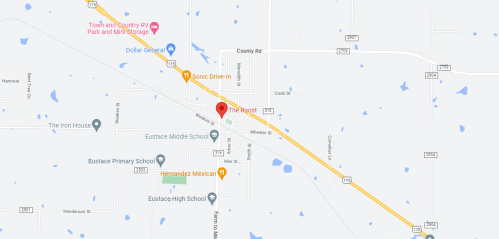 Map showing a section of Eustace, Texas, highlighting The Roost and nearby schools and businesses.