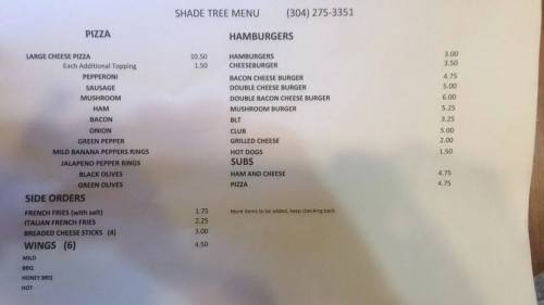 Menu from Shade Tree featuring pizza, hamburgers, subs, and side orders with prices listed for each item.