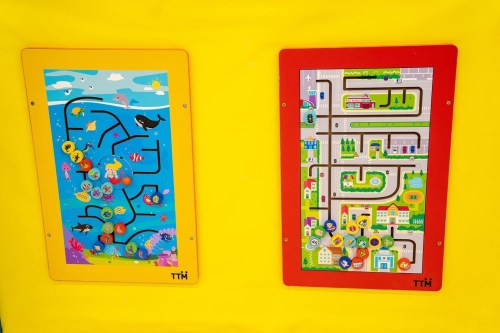 Two colorful activity boards for children: one with an underwater theme and the other depicting a city road map.