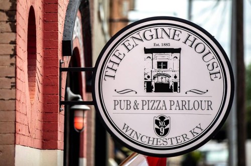 Sign for "The Engine House Pub & Pizza Parlour," established 1885, located in Winchester, KY.