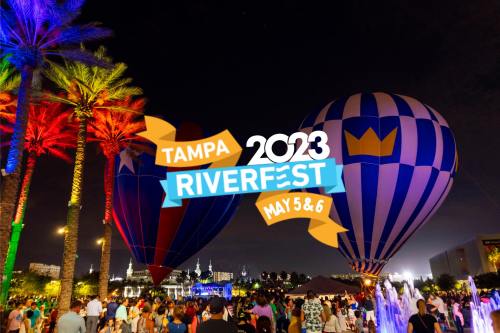 Colorful hot air balloons at night with palm trees, promoting Tampa Riverfest 2023 on May 5 and 6.