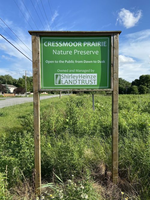 Sign for Cressmoor Prairie Nature Preserve, open to the public from dawn to dusk, managed by Shirley Heinze Land Trust.