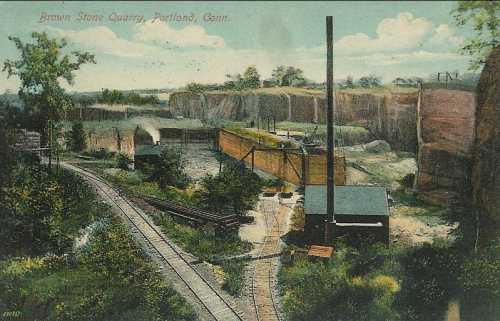 A vintage postcard depicting Brown Stone Quarry in Portland, Connecticut, with tracks and a quarry landscape.