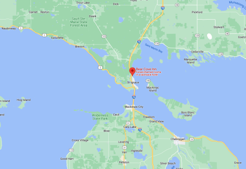 Map showing Bear Cove Inn's location near St. Ignace, Michigan, close to Mackinac Island and Lake Huron.