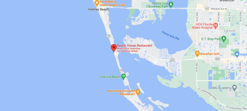 Map showing the location of Beach House Restaurant near Holmes Beach, Florida, with nearby landmarks and water features.