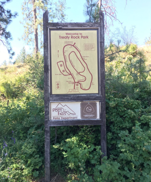 Sign at Treaty Rock Park displaying a map of the park layout and information from the Parks Department.