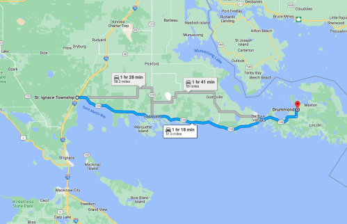 Map showing driving directions from St. Ignace Township to Drummond Island, with estimated travel times.