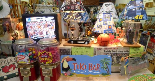 A booth of vintage items and antiques at a flea market in Florida