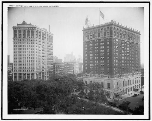 Historic black-and-white photo of the Whitney Block and Statler Hotel in Detroit, showcasing early 20th-century architecture.