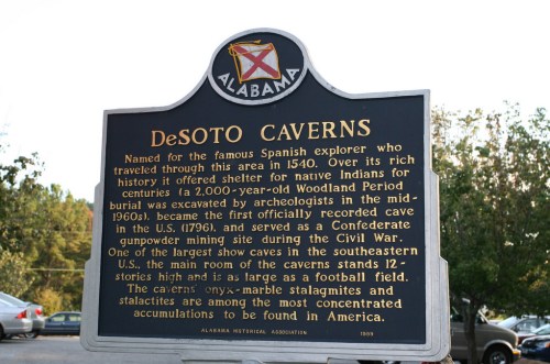 Historical marker about DeSoto Caverns in Alabama, detailing its significance and archaeological history.